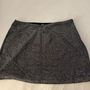 Large shimmer skirt. Great on top of bathing suits 
Stretch-Like NEW